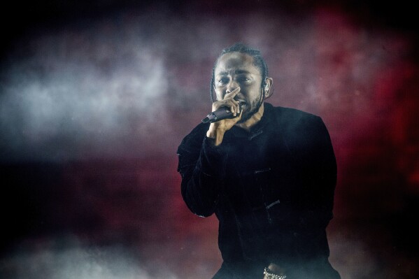 FILE – Kendrick Lamar performs at the Coachella Music & Arts Festival at the Empire Polo Club on Sunday, April 16, 2017 in Indio, California.  Apple Music announced on Wednesday May 22, 2024 its 10 greatest albums of all time and that of Lamar in 2012. “good child, mAAd city” came seventh on the list.  (Photo by Amy Harris/Invision/AP, file)