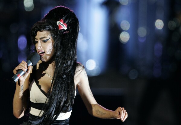 FILE - British singer Amy Winehouse performs at the 46664 charity concert in honor of Nelson Mandela's 90th birthday in London, Friday June 27, 2008 Apple Music announced Wednesday May 22, 2024 its 10 greatest albums of all time and that of Winehouse in 2006. 