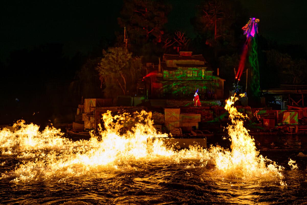 Disneyland's Rivers of America park is ravaged by fire. 