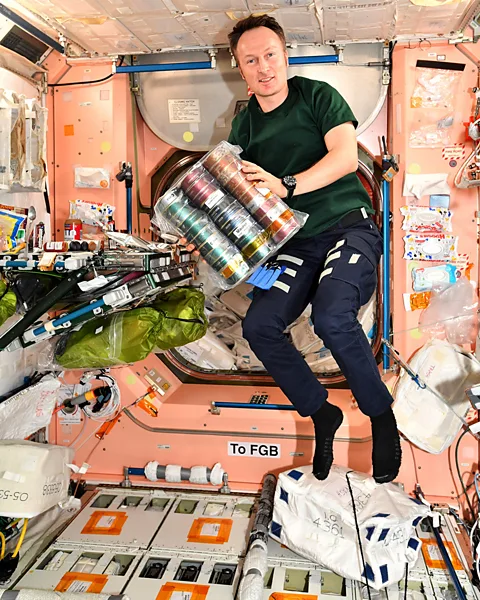 ESA/Nasa ESA astronaut Matthias Maurer holds a packet of space food from his home region of Saarland (ESA/Nasa)