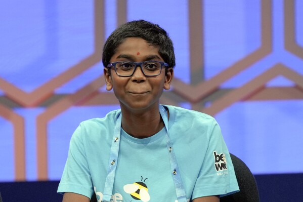 Bruhat Soma, 12, of Tampa, Fla., reacts after watching his video during the finals of the Scripps National Spelling Bee, in Oxon Hill, Md., Thursday, May 30, 2024. (AP Photo/Mariam Zuhaib)