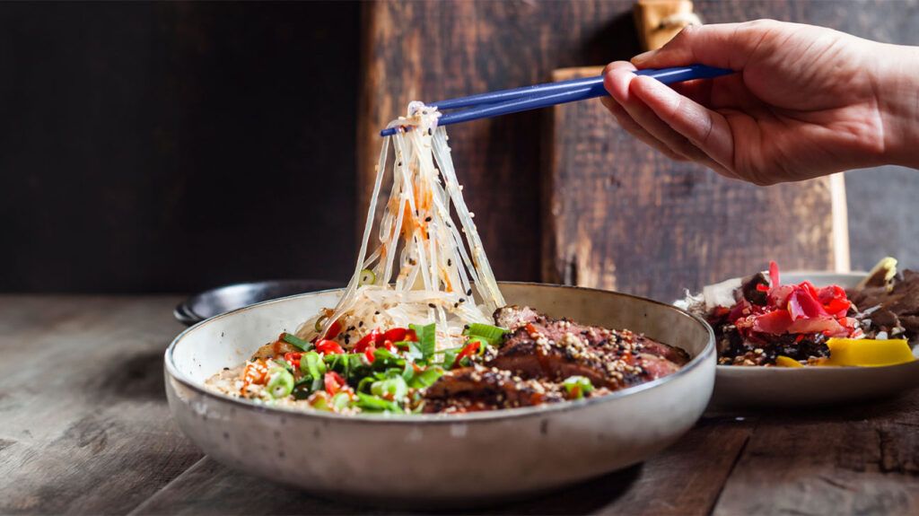 bowl of glass noodles, vegetables and protein