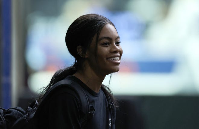 Gabby Douglas speaks to reporters after a training session at the XL Center before the Core Hydration Classic in Hartford, Connecticut.