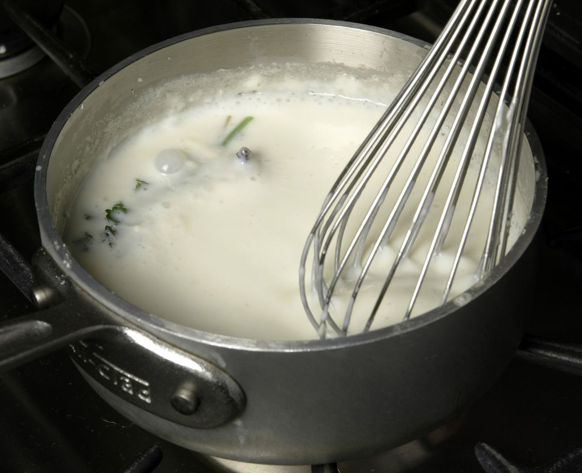 2. Whisk the béchamel sauce.