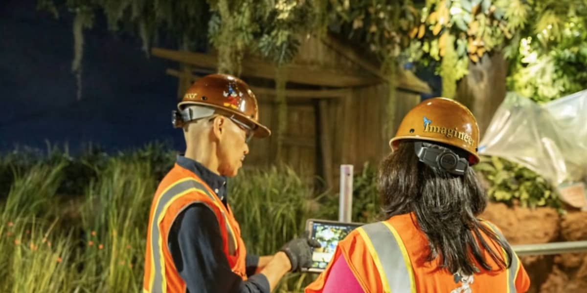 A photo of Imagineers working behind the scenes at Tiana's Bayou Adventure