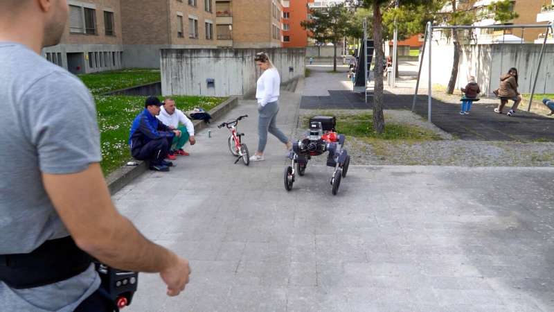 A robot with wheels and legs that navigates autonomously