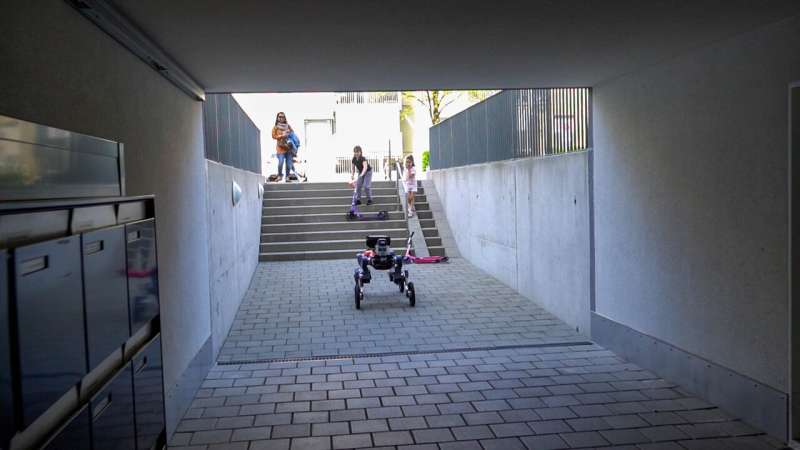 A robot with wheels and legs that navigates autonomously