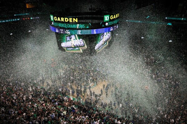 Confetti falls after the Boston Celtics defeated the Dallas Mavericks in Game 5 of the NBA Basketball Finals, Monday, June 17, 2024, in Boston.  (AP Photo/Michael Dwyer)