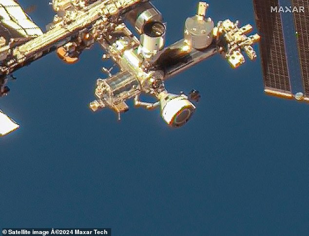 This image provided by Maxar Technologies taken June 7, 2024 shows the Boeing Starliner spacecraft docked at the forward port of the International Space Station (ISS) on the station's Harmony module.  Since Starliner is docked with the ISS, astronauts can still enter and exit Starliner as they please.