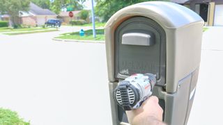 Drilling a hole in the back of a mailbox for the Ring Mailbox Sensor antenna