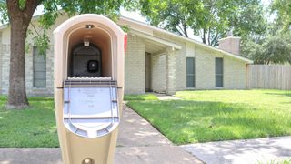 The Ring Mailbox Sensor installed at the bottom of a mailbox