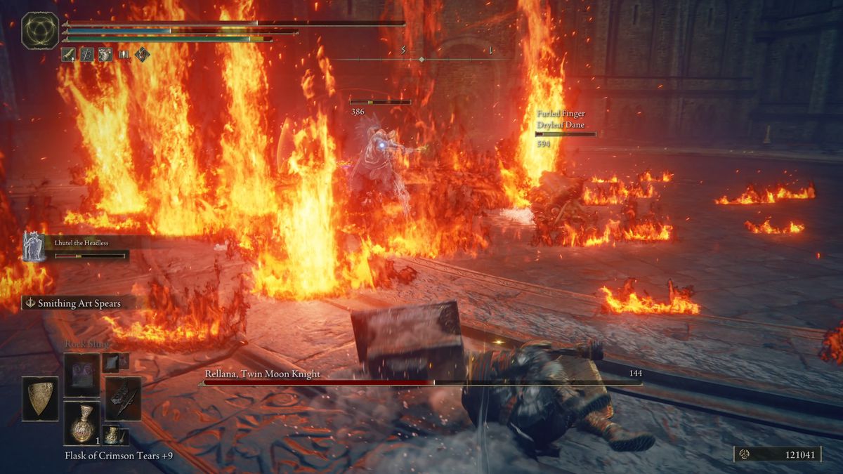 Plumes of lava and fire around Rellana in the Elden Ring DLC