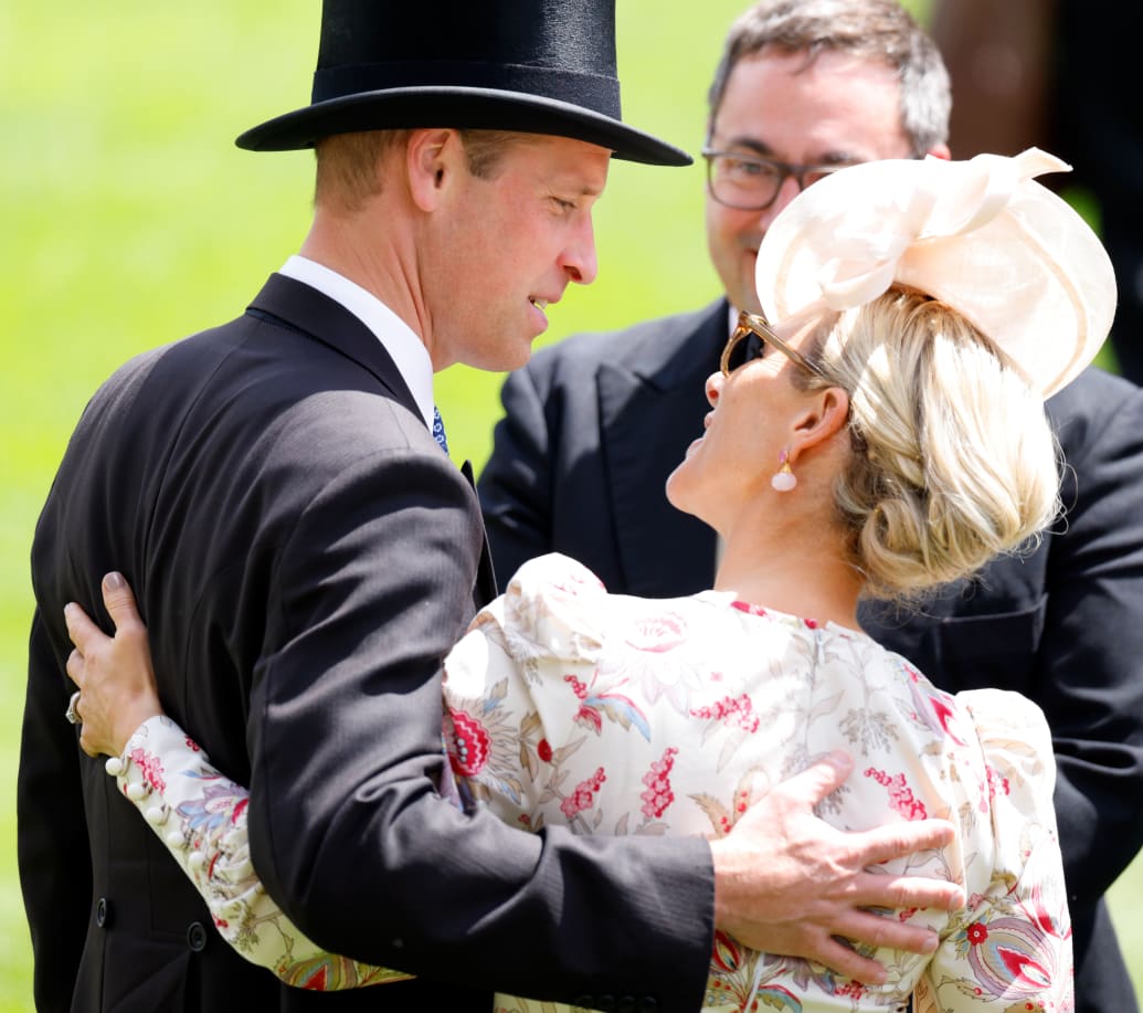 Prince William, Prince of Wales, greets Zara Tindall during day two of Royal Ascot 2024 at Ascot Racecourse on June 19, 2024 in Ascot, England.