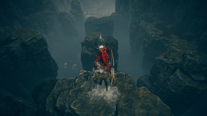 A warrior jumps onto a rock platform en route to the Cerulean Coast in Elden Ring Shadow of the Erdtree.