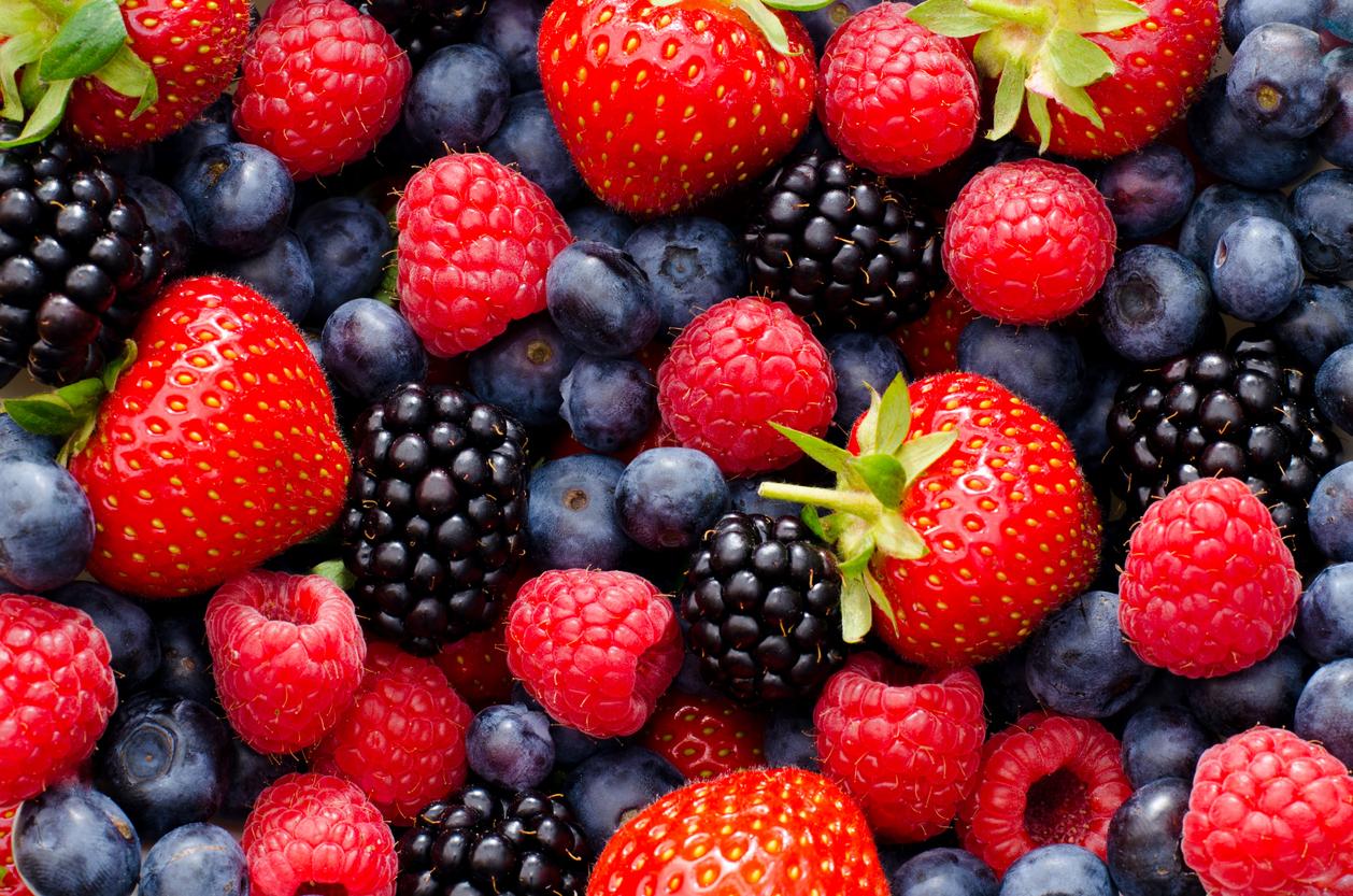 A close up of strawberries, raspberries, blackberries and blueberries