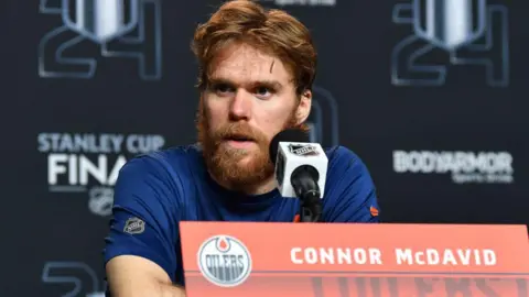 Getty Images Connor McDavid during a post-match press conference