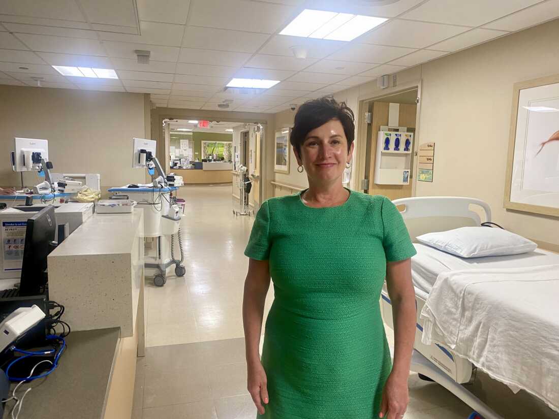 Barbara Cottrell, AtlantiCare's chief nursing officer, stands in the hospital hallway.