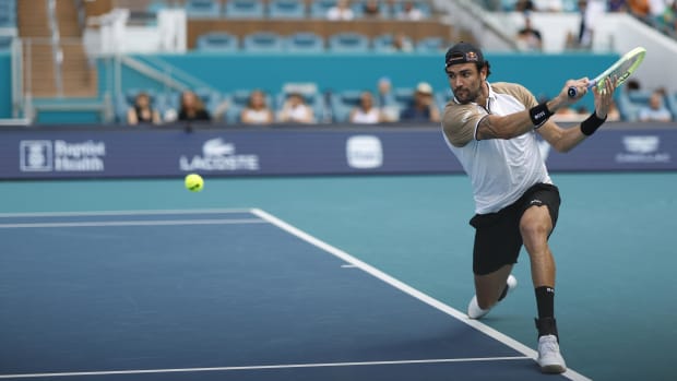 Berrettini finishes backhanded.