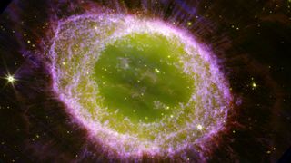 a cloud of pink and green gas in space