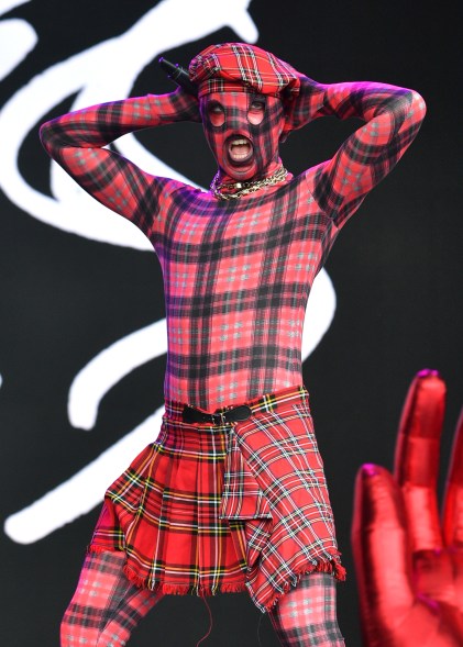 The Lynks perform on the Park Stage at Glastonbury Festival 2024, wearing plaid outfits