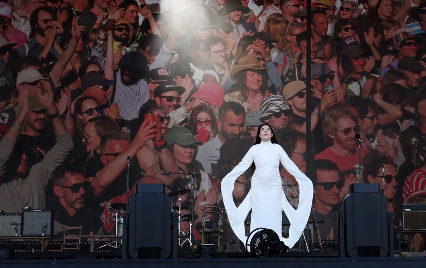 Serbian creative artist Marina Abramovic wears a dress depicting the symbol of peace.