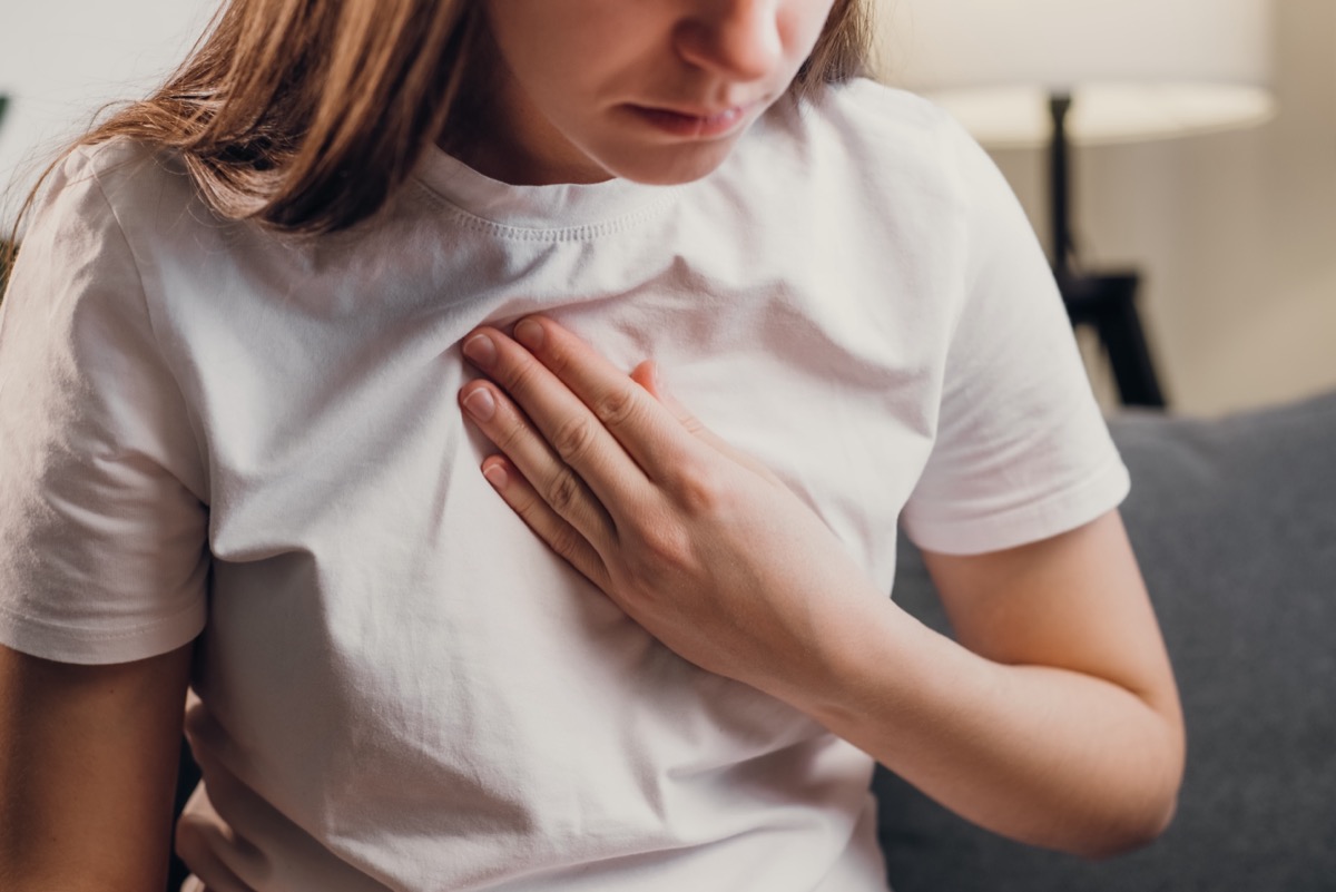 woman having trouble breathing