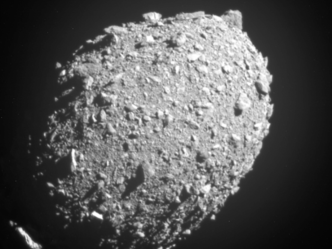 The moon of the asteroid Dimorphos as seen by NASA's DART spacecraft 11 seconds before the impact that changed its trajectory through space, in the first test of an asteroid's deflection.