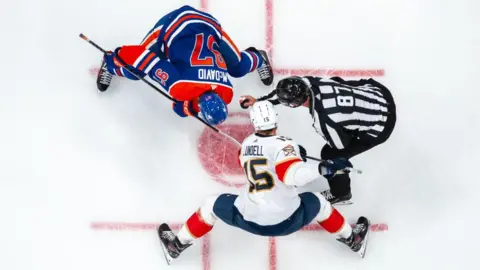 Getty Images Connor McDavid #97 of the Edmonton Oilers faces Anton Lundell #15 of the Florida Panthers during Game 6 of the 2024 Stanley Cup Finals at Rogers Place on June 21, 2024 in Edmonton, Alberta, Canada