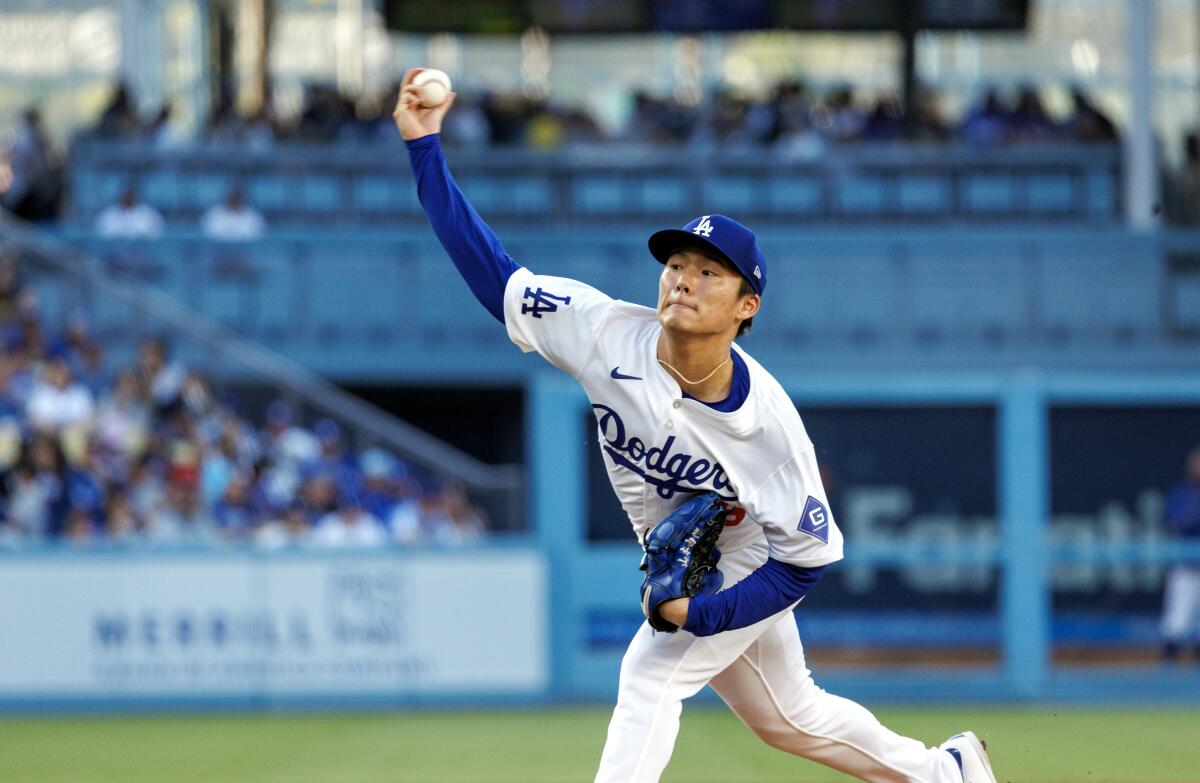 Dodgers right-hander Yoshinobu Yamamoto debuts his home uniform at Dodger Stadium