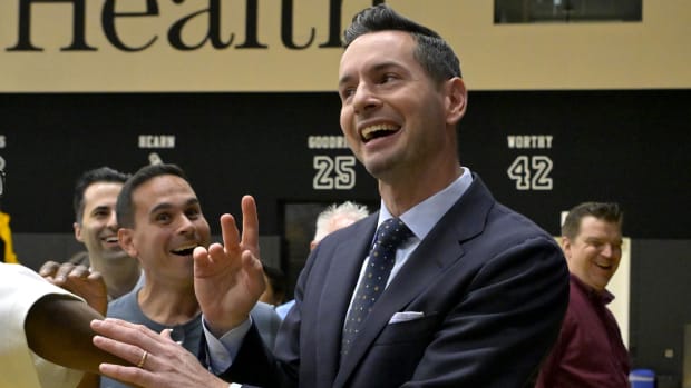 June 24, 2024;  El Segundo, California, United States;  JJ Redick laughs with members of the media during his Lakers introductory press conference.