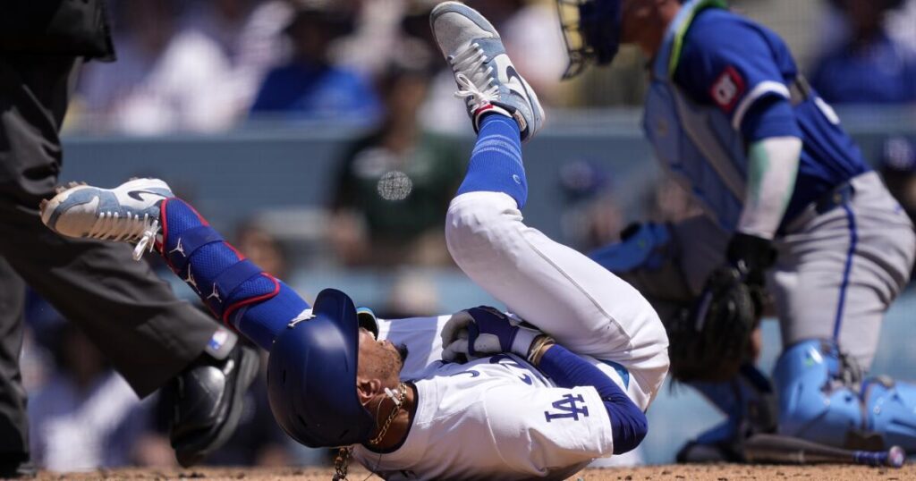 Mookie Betts will be out for several weeks after fracturing his hand in Dodgers' victory