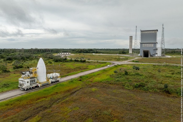 Part of a rocket is moved into position