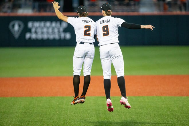 Oregon State's Jabin Trosky and Mason Guerra celebrate victory over Tulane in the Corvallis Regional of the NCAA Tournament on Friday, May 31, 2024, at Goss Stadium in Corvallis, Oregon.