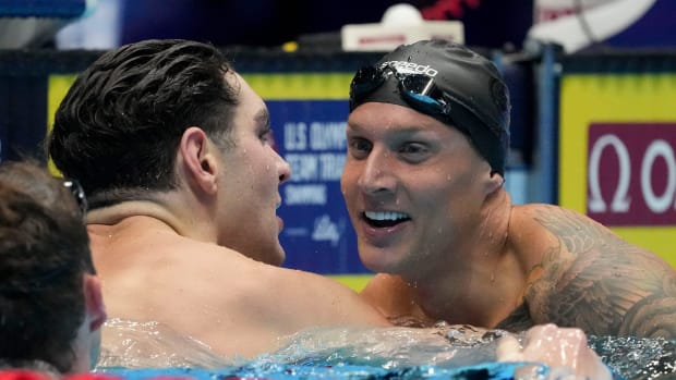 Jack Alexy celebrates with Caeleb Dressel after finishing second and third in the 100 meter freestyle final at the Olympic Trials