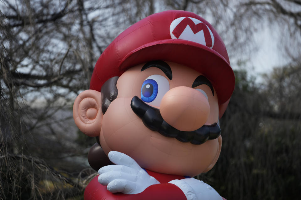 FILE – This photo shows a balloon of the character Mario from Mario Bros.  during an event in Tokyo on February 15, 2024. Japanese video game manufacturer Nintendo announced on Tuesday May 7, 2024 that it would make an announcement regarding a successor.  on its Switch home console before March 2025. (AP Photo/Hiro Komae, File)