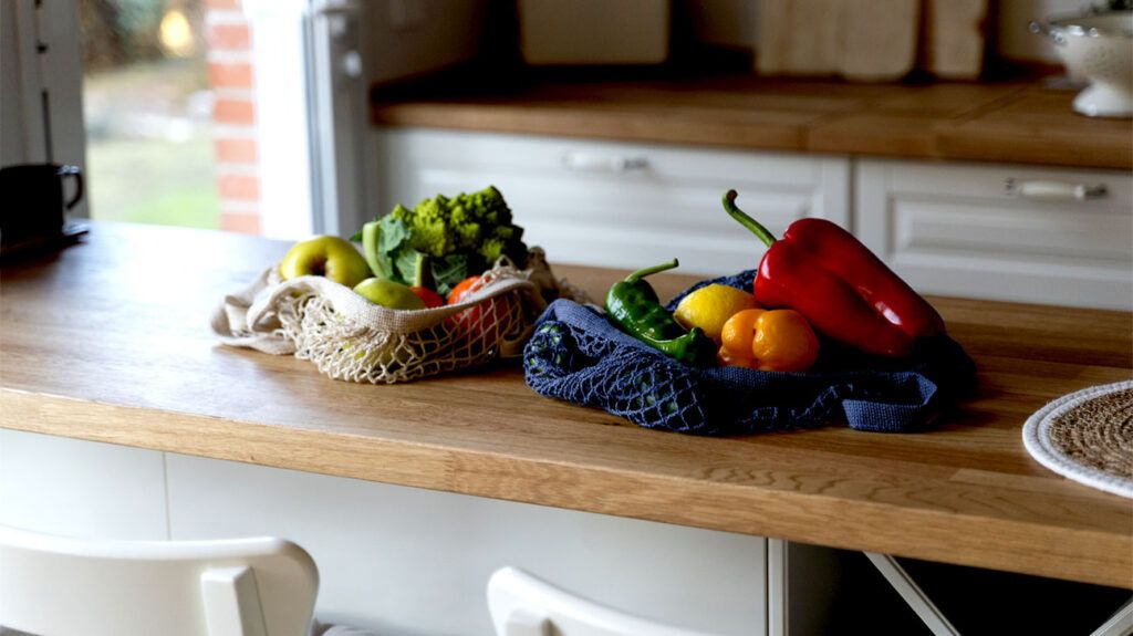 Bagged vegetables on the kitchen counter