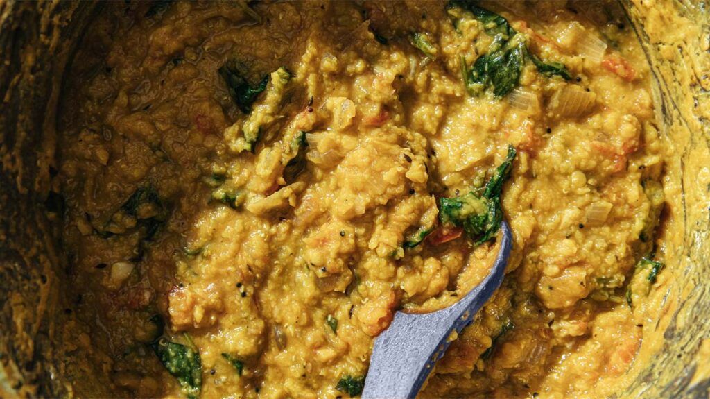 A close-up of a lentil dhal, rich in plant-based protein