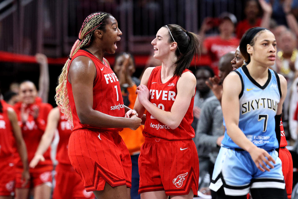 INDIANAPOLIS, INDIANA - JUNE 01: Aliyah Boston #7 and Caitlin Clark #22 of the Indiana Fever celebrate after defeating the Chicago Sky during the game at Gainbridge Fieldhouse on June 01, 2024 in Indianapolis, Indiana.  NOTE TO USER: User expressly acknowledges and agrees that by downloading and/or using this photograph, User consents to the terms and conditions of the Getty Images License Agreement.  (Photo by Andy Lyons/Getty Images)