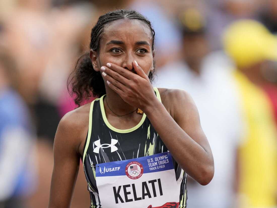 Weini Kelati celebrates her victory in the women's 10,000 meter final at the U.S. Olympic Track and Field Team Trials.