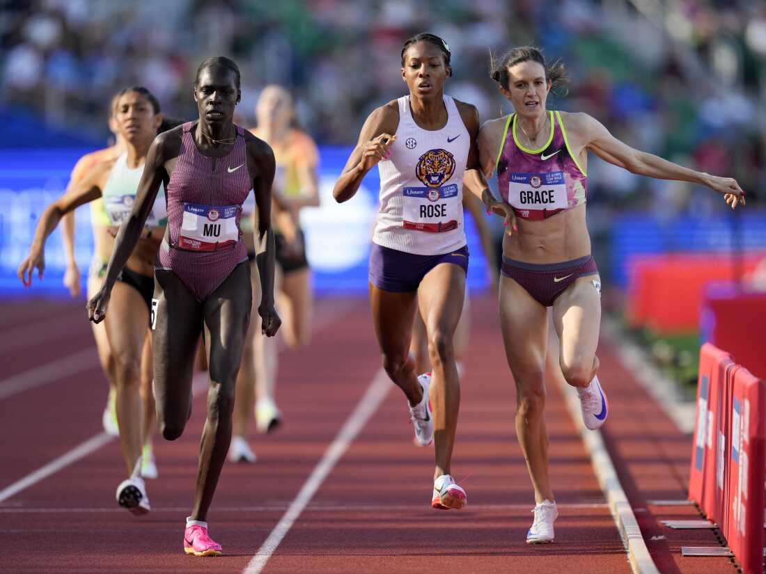 Athing Mu wins heat in women's 800m semi-final as Kate Grace and Michaela Rose collide at Olympic trials.