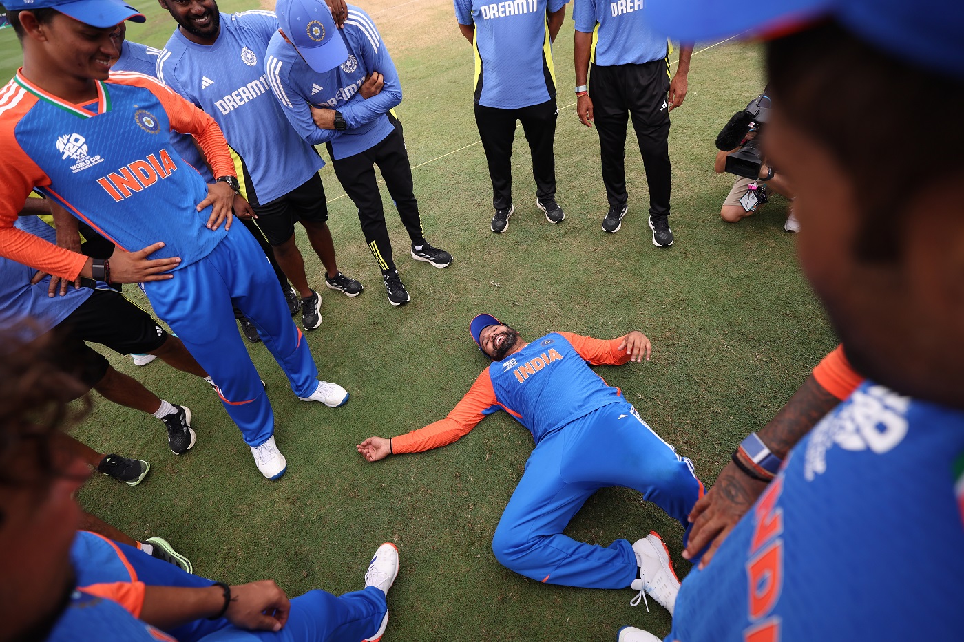 Let me rest on my laurels now: Rohit enjoys lying back surrounded by his team