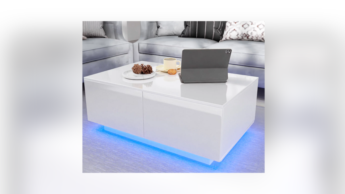 Transform your living room into a modern beauty with the help of this LED coffee table. 