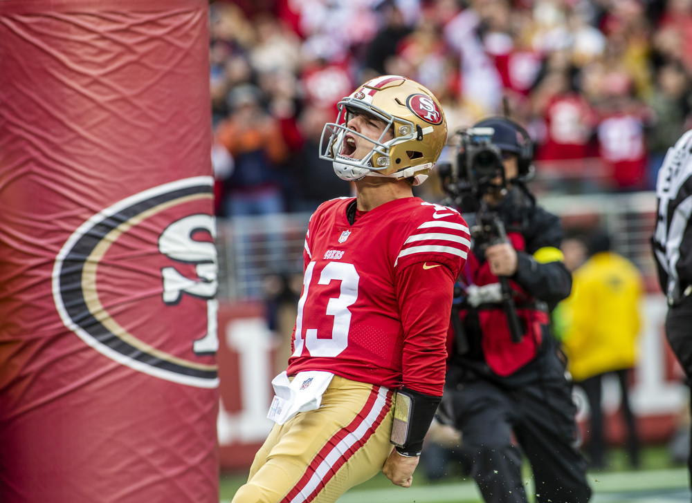 SANTA CLARA, CA - DECEMBER 11: San Francisco 49ers quarterback Brock Purdy (13) celebrates a touchdown in the second quarter of an NFL game between the San Francisco 49ers and the Tampa Bay Buccaneers on December 11, 2022 at Levi's Stadium in Santa Clara, California. (Photo by Tony Ding/Icon Sportswire)