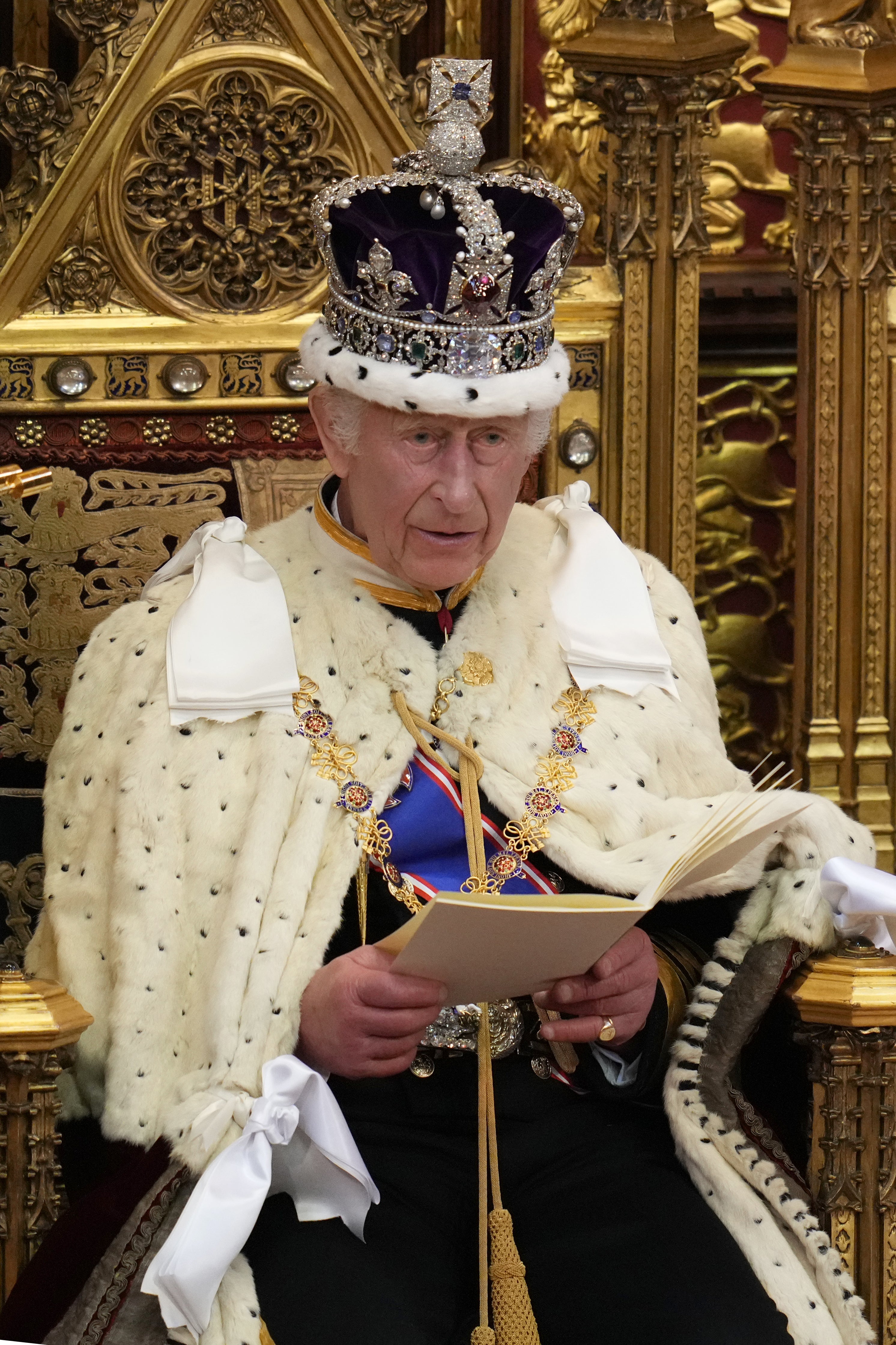 Charles looks up as he reads the King's Speech, during the State Opening of Parliament (Kirsty Wigglesworth/PA)