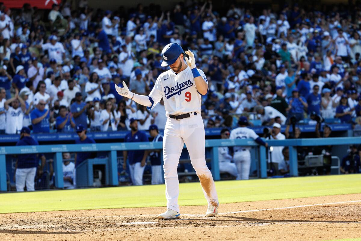 Dodgers second baseman Gavin Lux reacts as he crosses the plate after hitting a solo home run against the Boston Red Sox 