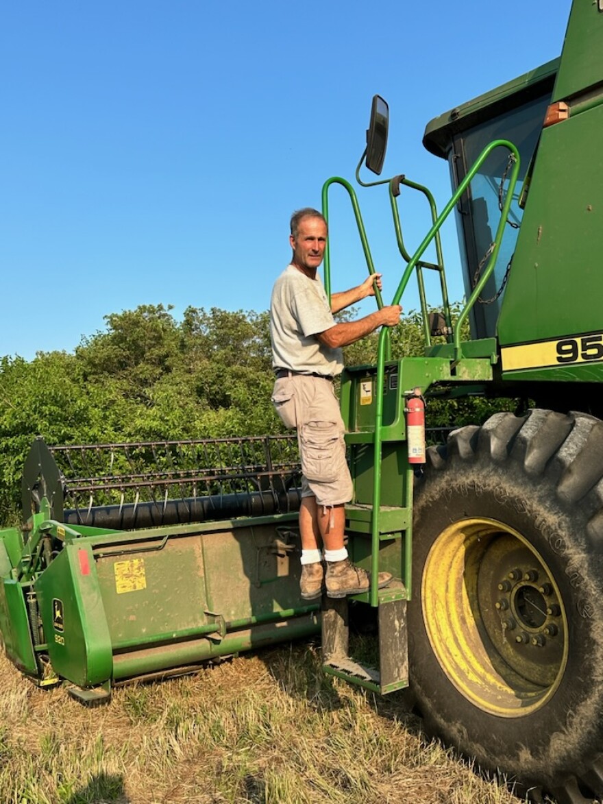 John Kiefner rides a piece of equipment on his farm in Will County, Illinois. He contacted the University of Illinois to have soil samples taken from his farm after hearing about Margenot's work.