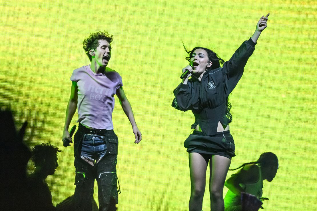 LONDON, ENGLAND - JUNE 27: Charli XCX joins Troye Sivan on stage during the Something to Give Each Other Tour at OVO Arena Wembley on June 27, 2024 in London, England. (Photo by Katja Ogrin/Redferns)