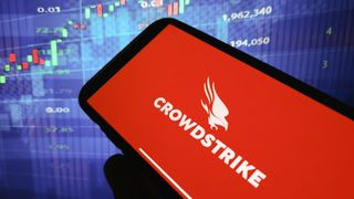 Crowdstrike red logo on a smartphone in front of a blue background