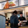 A customer pays for his meal at a Chipotle Mexican Grill restaurant in Austin, Texas. Chipotle says portion sizes have not decreased, despite complaints shared on social media.