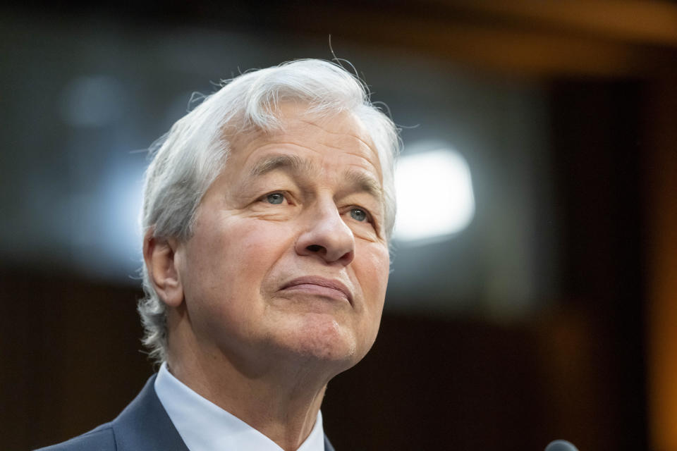 Jamie Dimon, chairman and CEO of JPMorgan Chase & Co., listens during a Senate Banking, Housing and Urban Affairs Committee oversight hearing to examine Wall Street companies on Capitol Hill, Wednesday, Dec. 6, 2023, in Washington. (AP Photo/Alex Brandon)